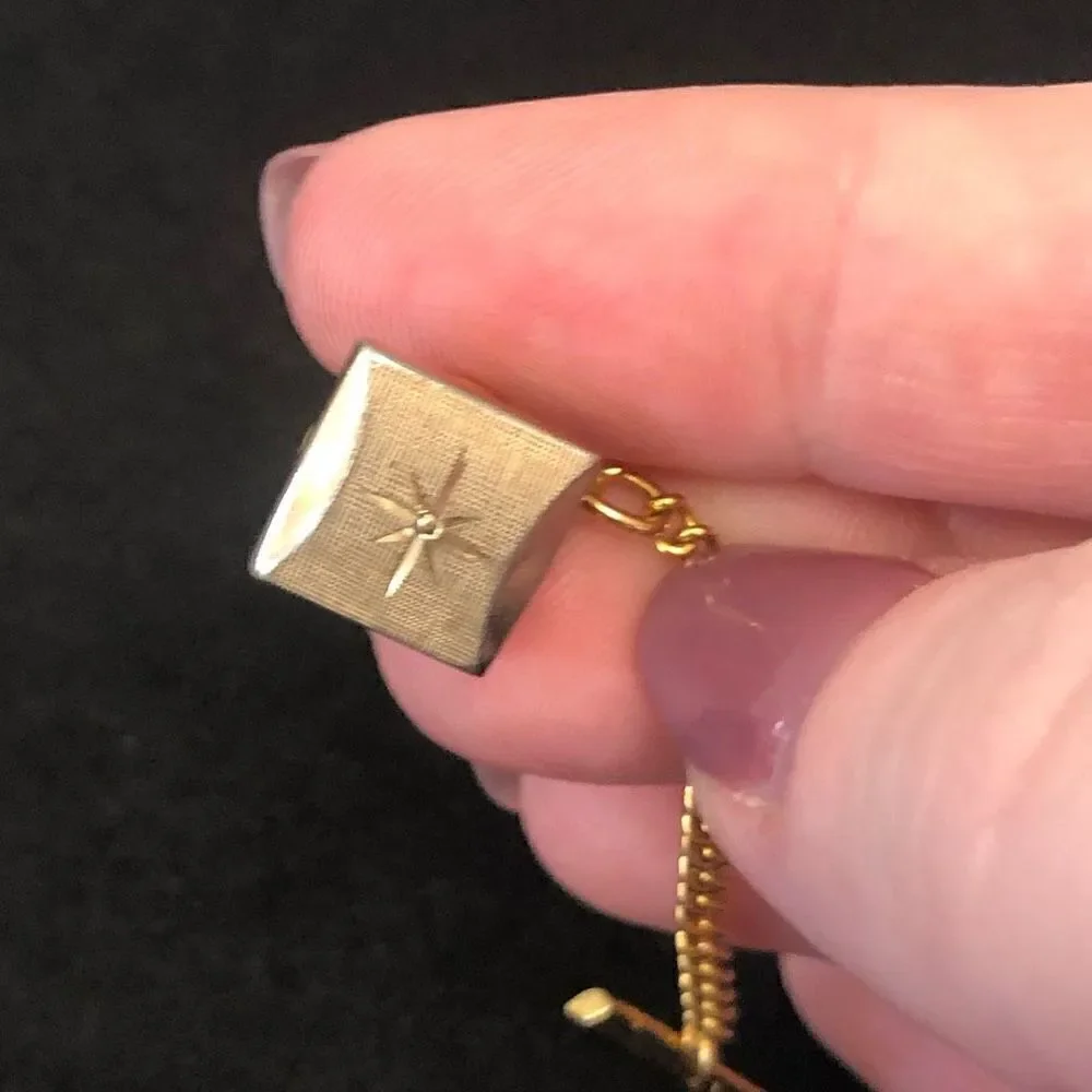 vintage mcm swank gold tone‎ starburst with textured background tie tac